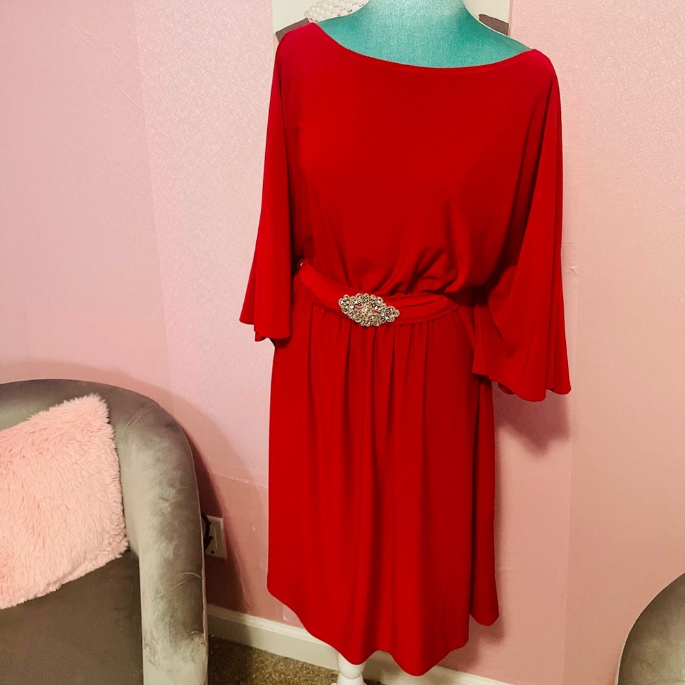 Red bat wing embellished dress.